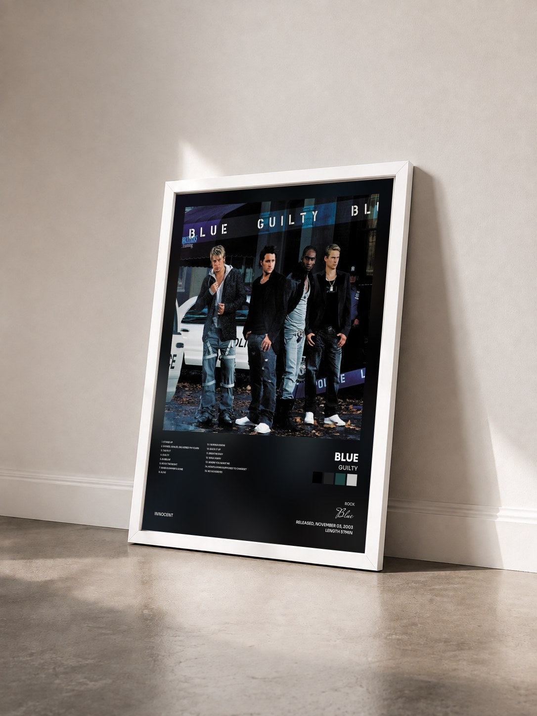 #blanc Tableau de l'album Guilty de Blue vu de trois quarts, cadre blanc