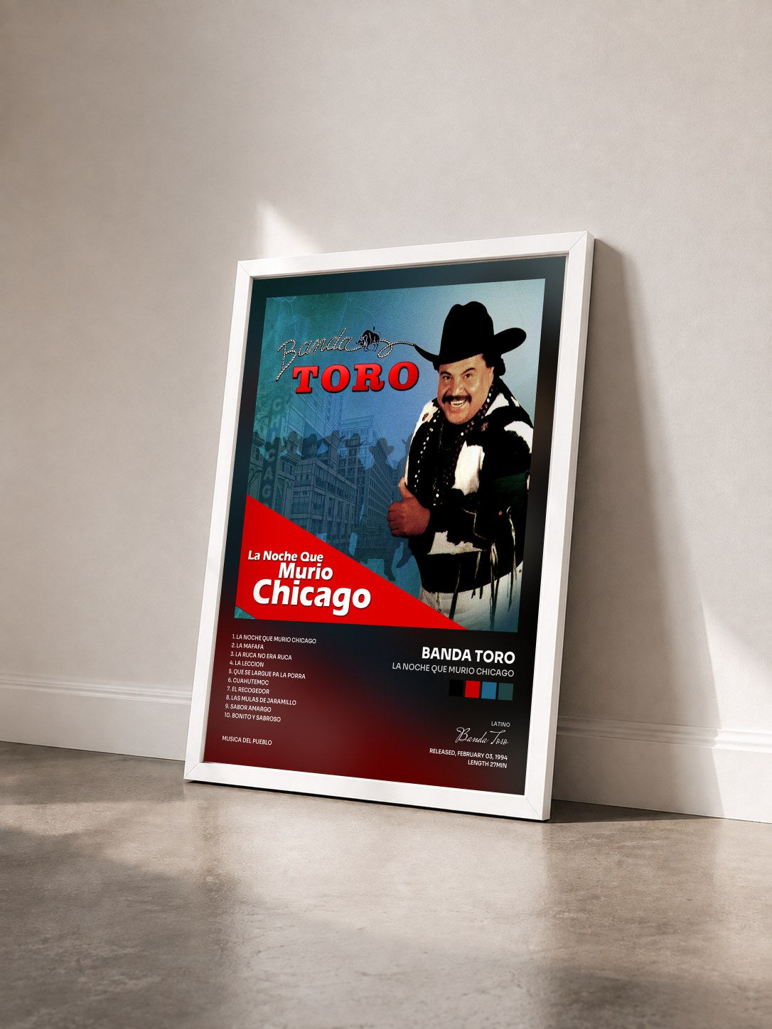 #blanc Tableau de l'album La Noche Que Murio Chicago de Banda Toro vu de trois quarts, cadre blanc
