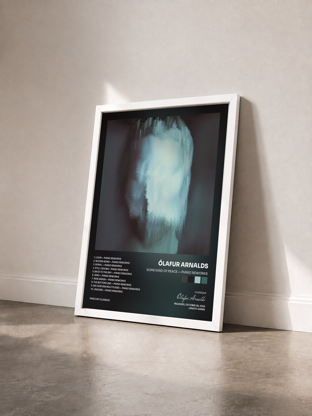 #blanc Tableau de l'album some kind of peace — piano reworks de Ólafur Arnalds vu de trois quarts, cadre blanc