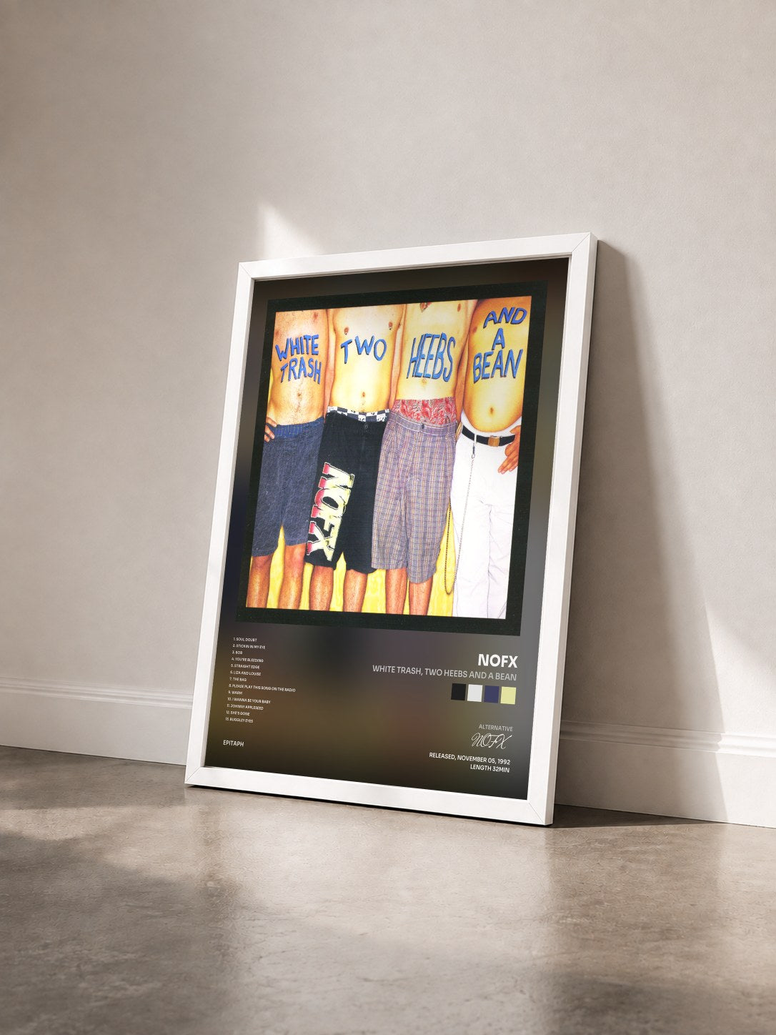 #blanc Tableau de l'album White Trash, Two Heebs and a Bean de NOFX vu de trois quarts, cadre blanc