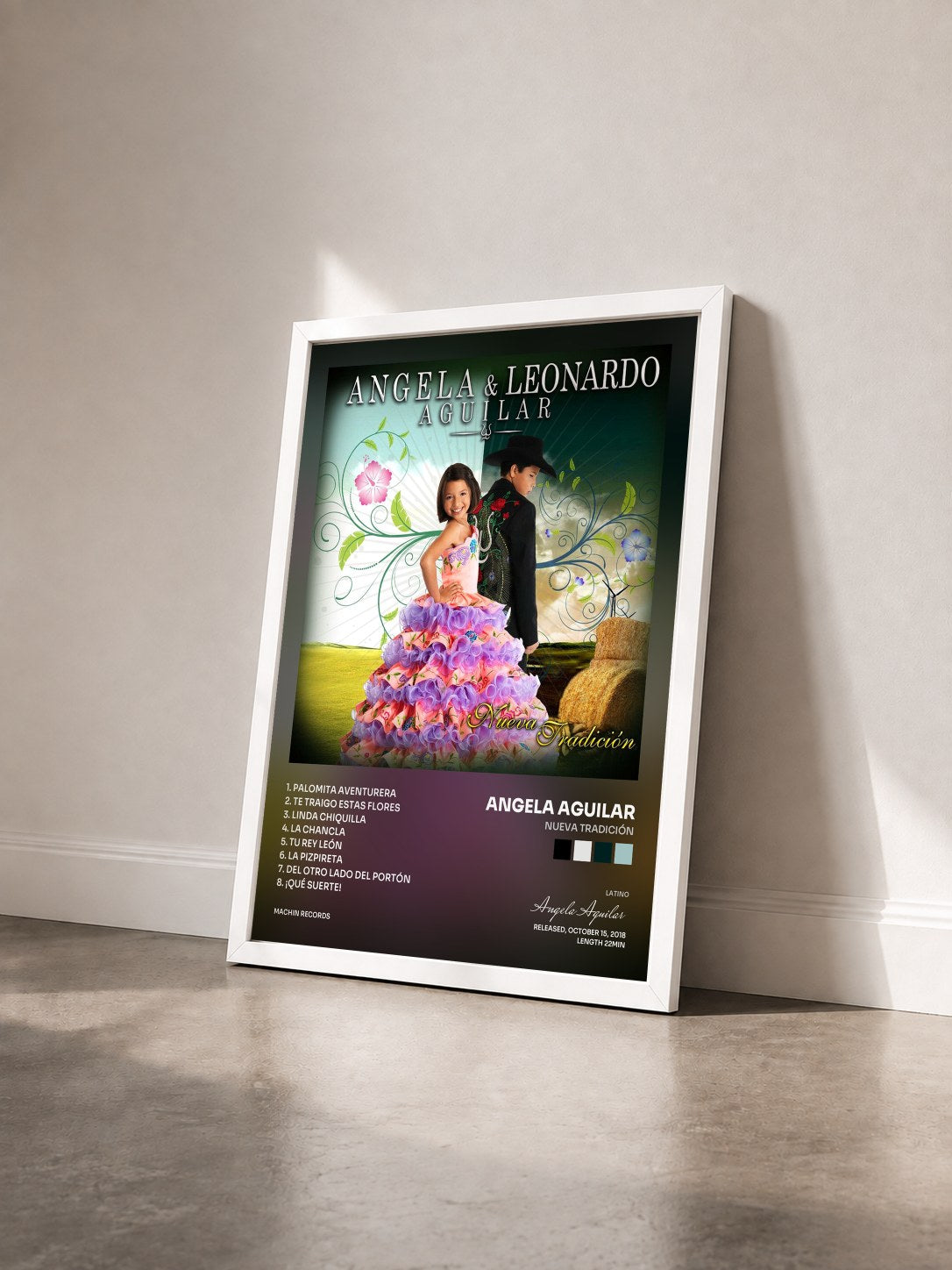 #blanc Tableau de l'album Nueva Tradición de Angela Aguilar vu de trois quarts, cadre blanc