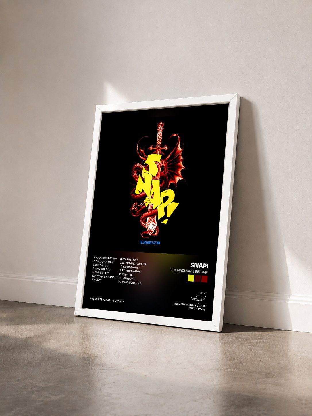 #blanc Tableau de l'album The Madman's Return de Snap! vu de trois quarts, cadre blanc