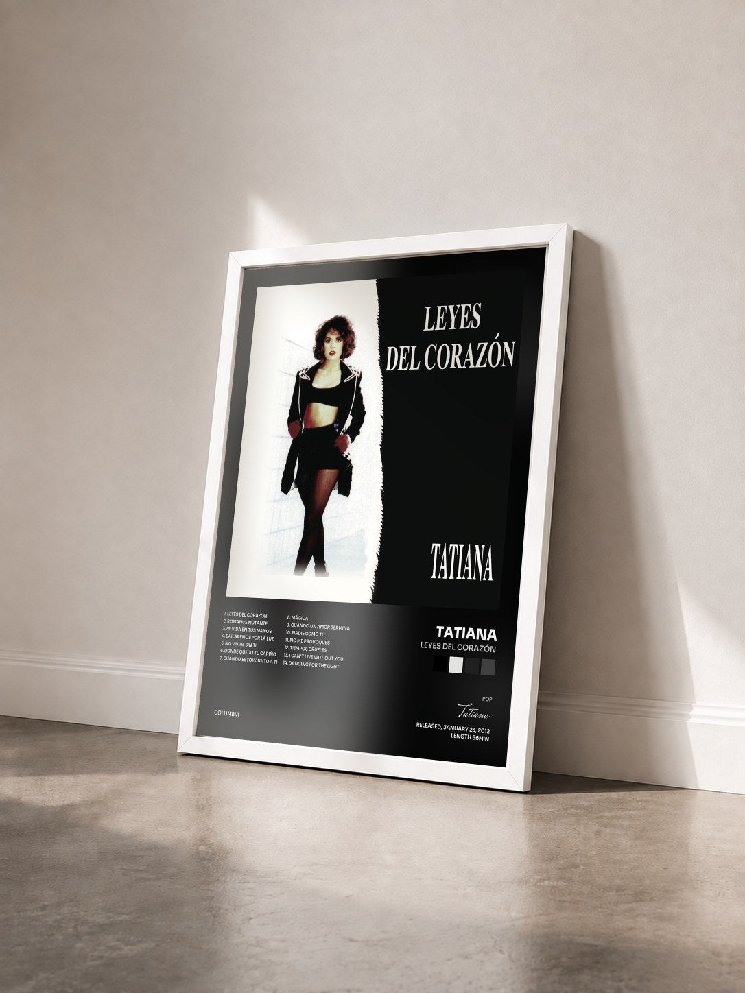 #blanc Tableau de l'album Leyes Del Corazón de Tatiana vu de trois quarts, cadre blanc