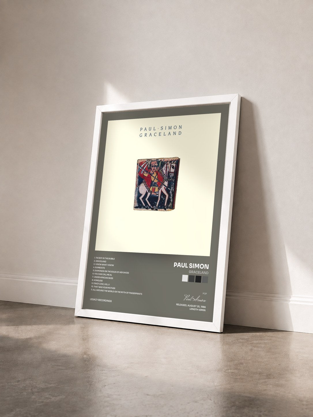 #blanc Tableau de l'album Graceland de Paul Simon vu de trois quarts, cadre blanc