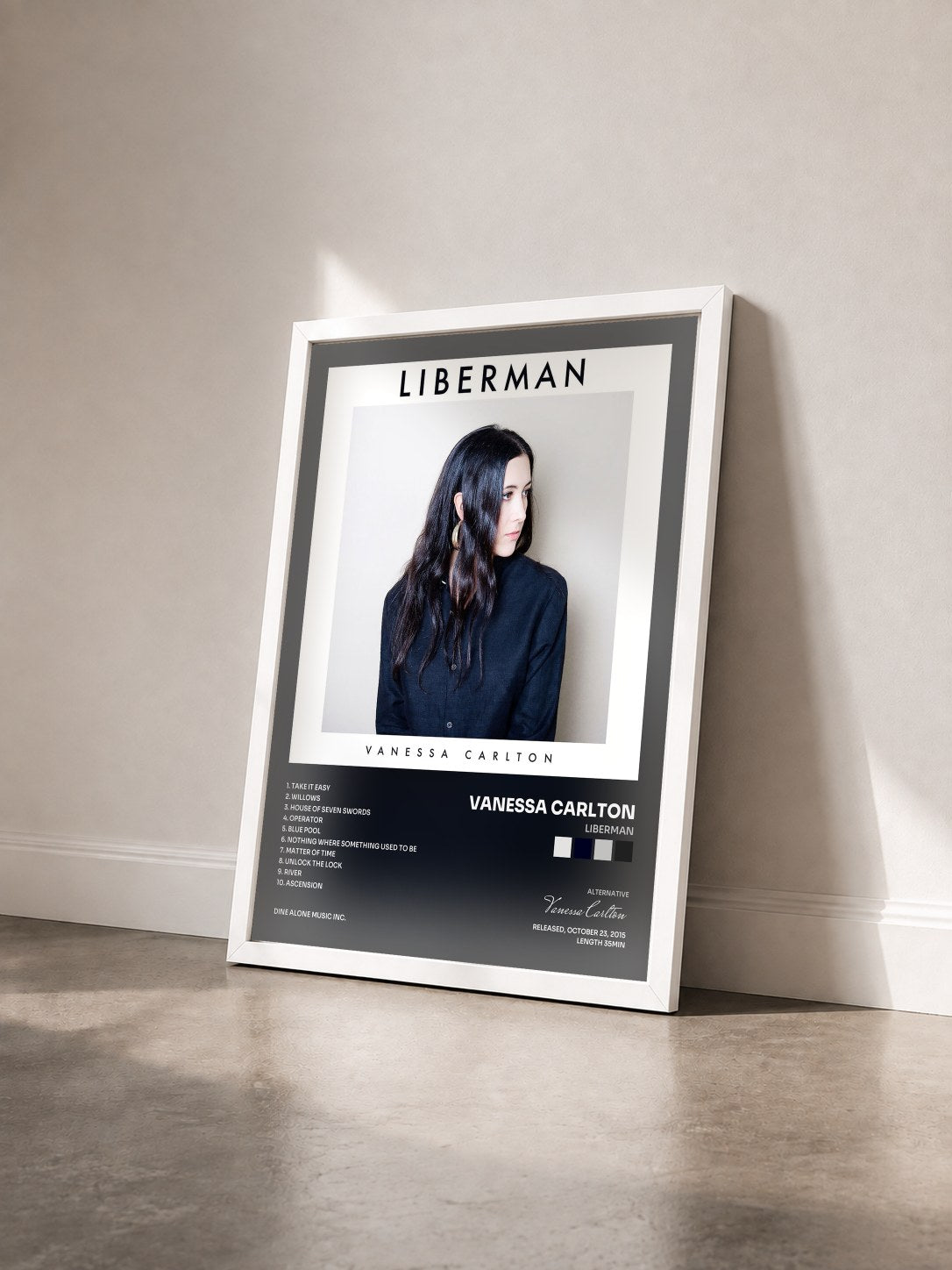 #blanc Tableau de l'album Liberman de Vanessa Carlton vu de trois quarts, cadre blanc