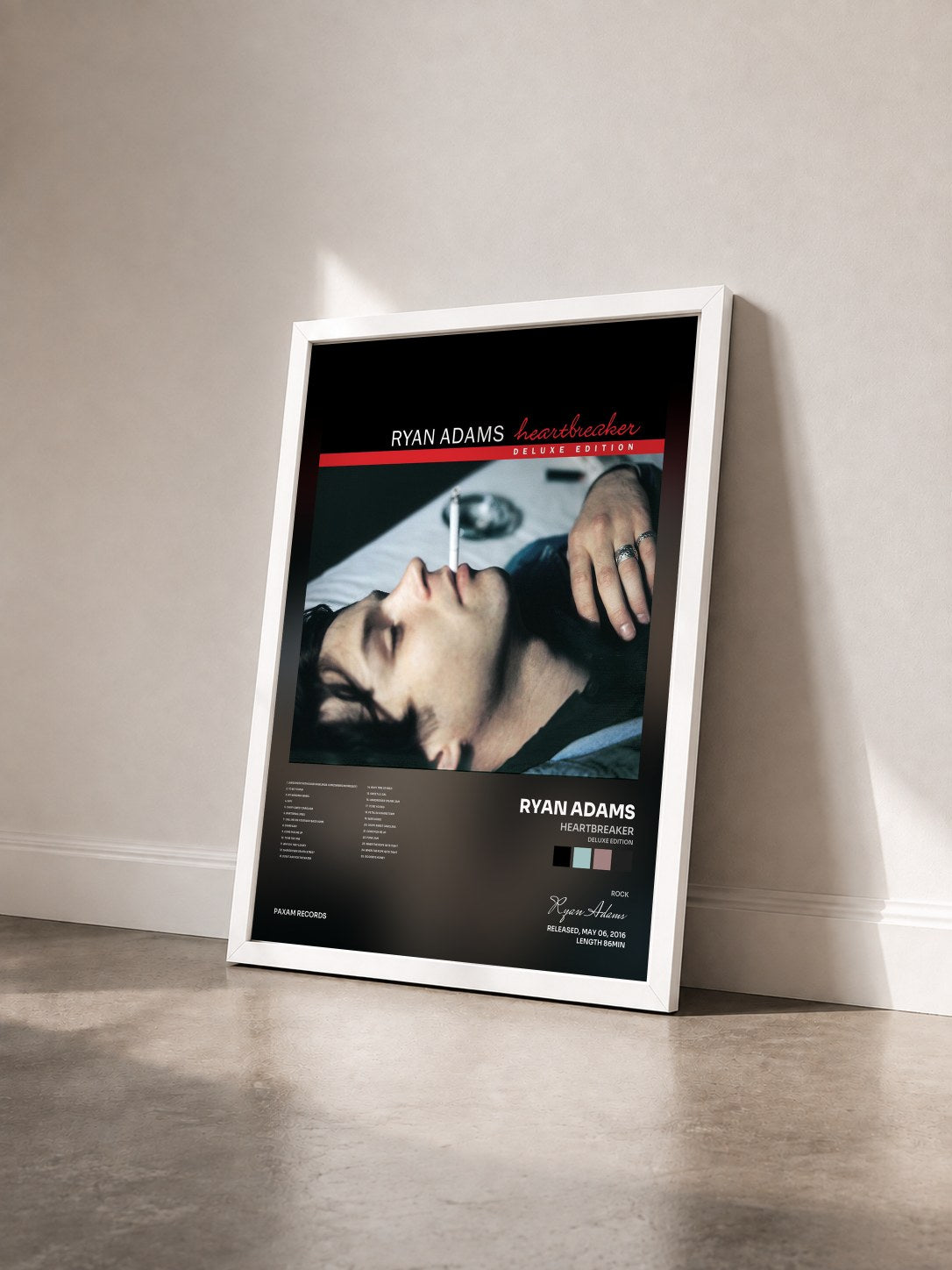 #blanc Tableau de l'album Heartbreaker (Deluxe Edition) de Ryan Adams vu de trois quarts, cadre blanc