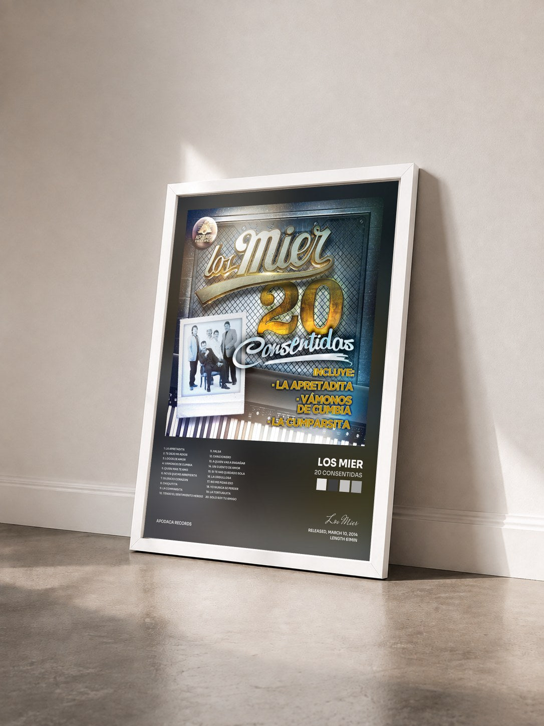 #blanc Tableau de l'album 20 Consentidas de Los Mier vu de trois quarts, cadre blanc