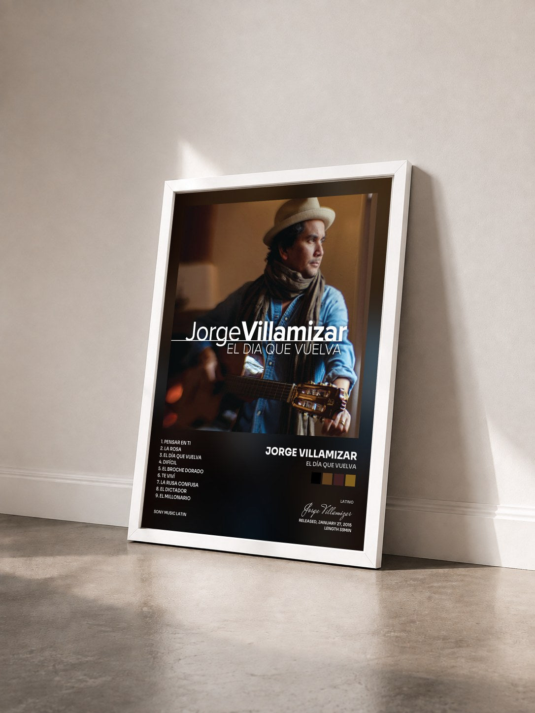 #blanc Tableau de l'album El Día Que Vuelva de Jorge Villamizar vu de trois quarts, cadre blanc
