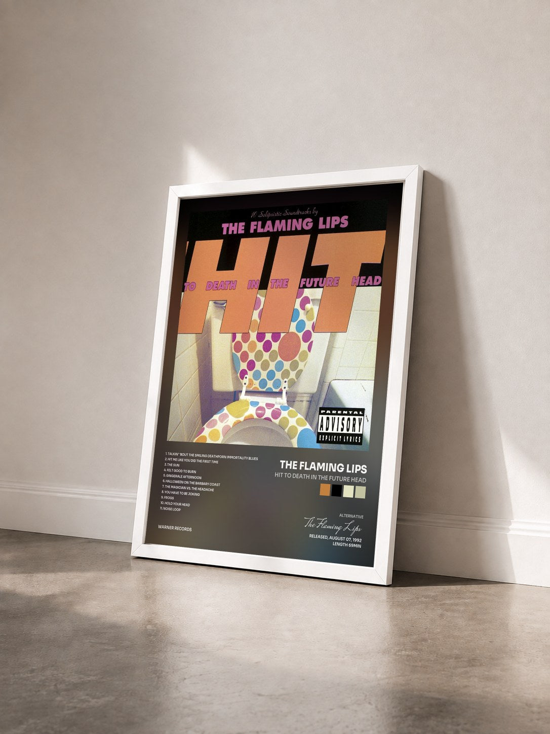 #blanc Tableau de l'album Hit to Death in the Future Head de The Flaming Lips vu de trois quarts, cadre blanc