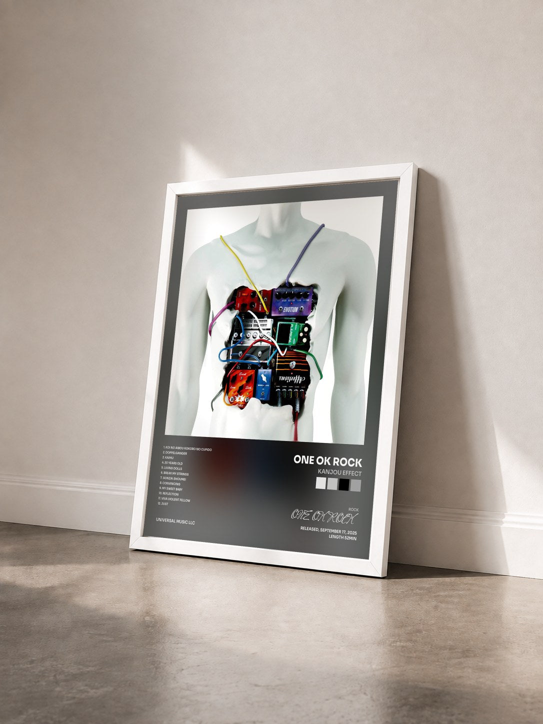 #blanc Tableau de l'album Kanjou Effect de ONE OK ROCK vu de trois quarts, cadre blanc
