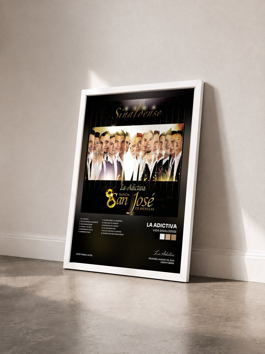 #blanc Tableau de l'album Vida Sinaloense de La Adictiva vu de trois quarts, cadre blanc