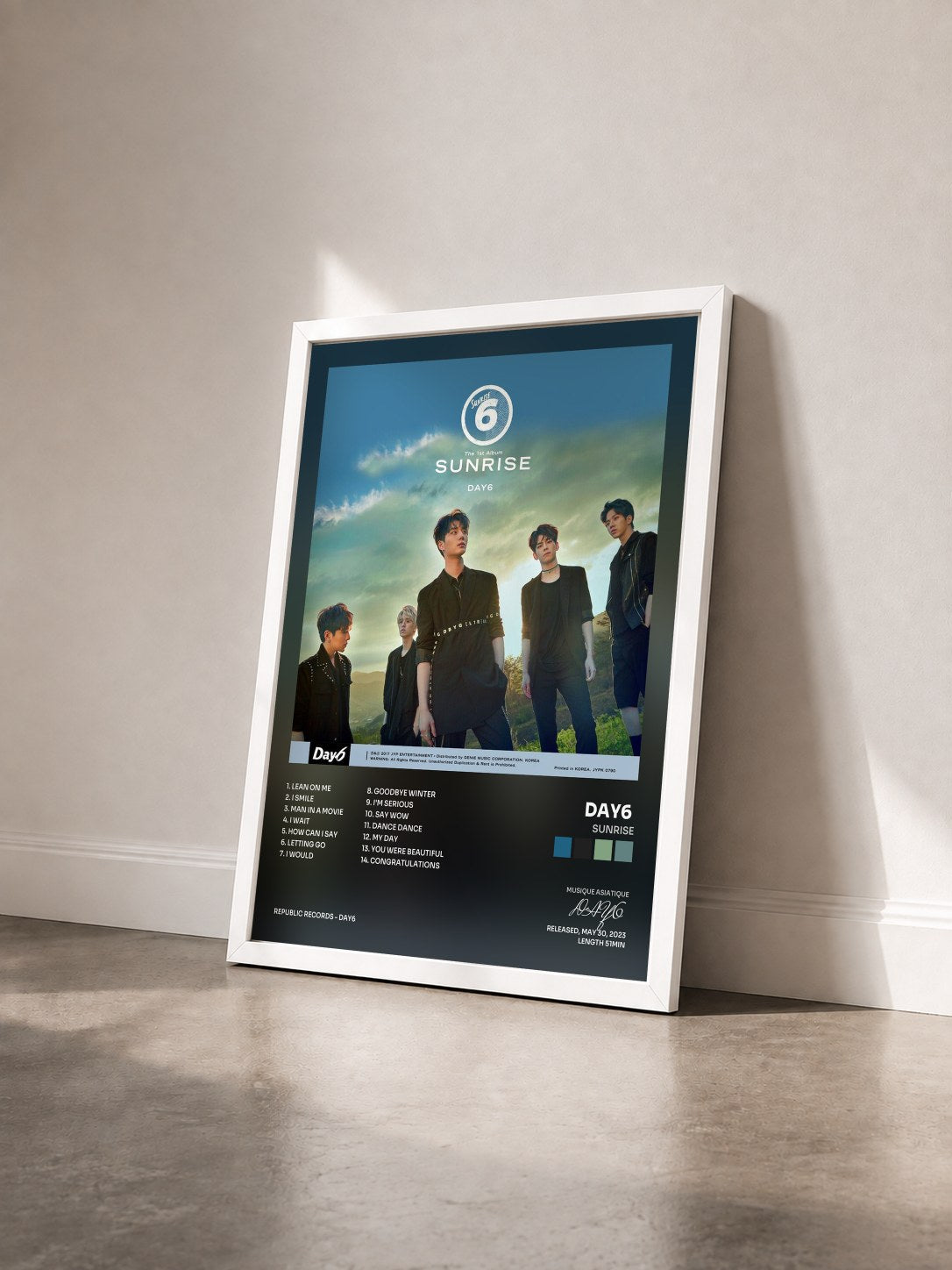 #blanc Tableau de l'album SUNRISE de DAY6  vu de trois quarts, cadre blanc