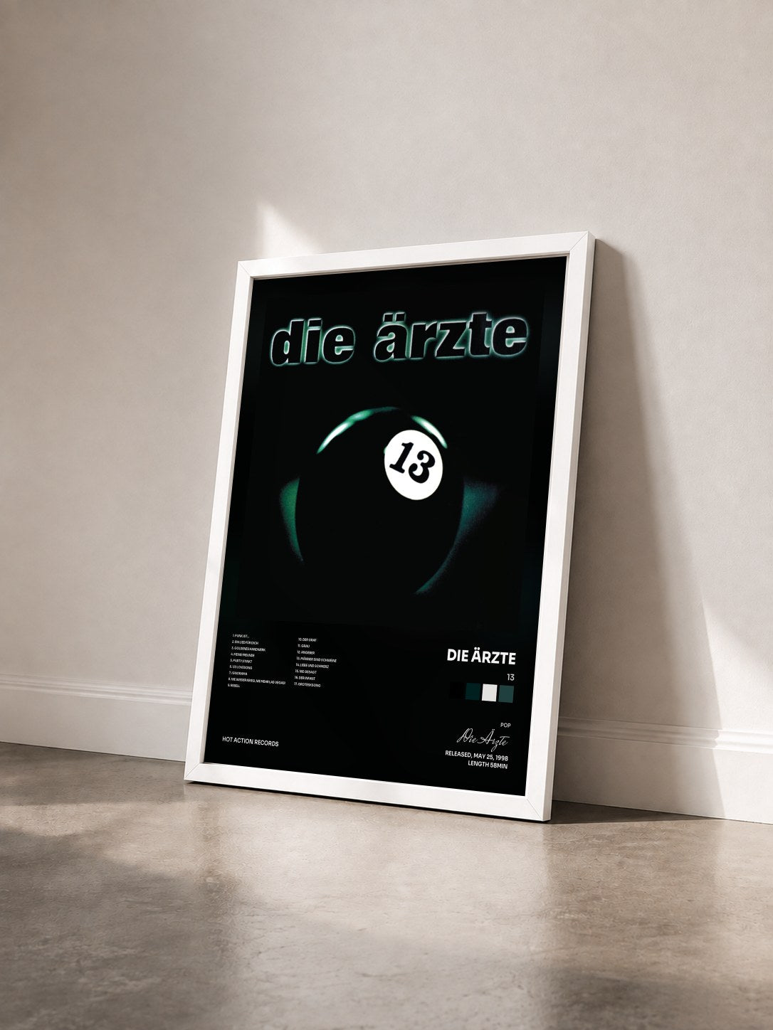 #blanc Tableau de l'album 13 de Die Ärzte vu de trois quarts, cadre blanc