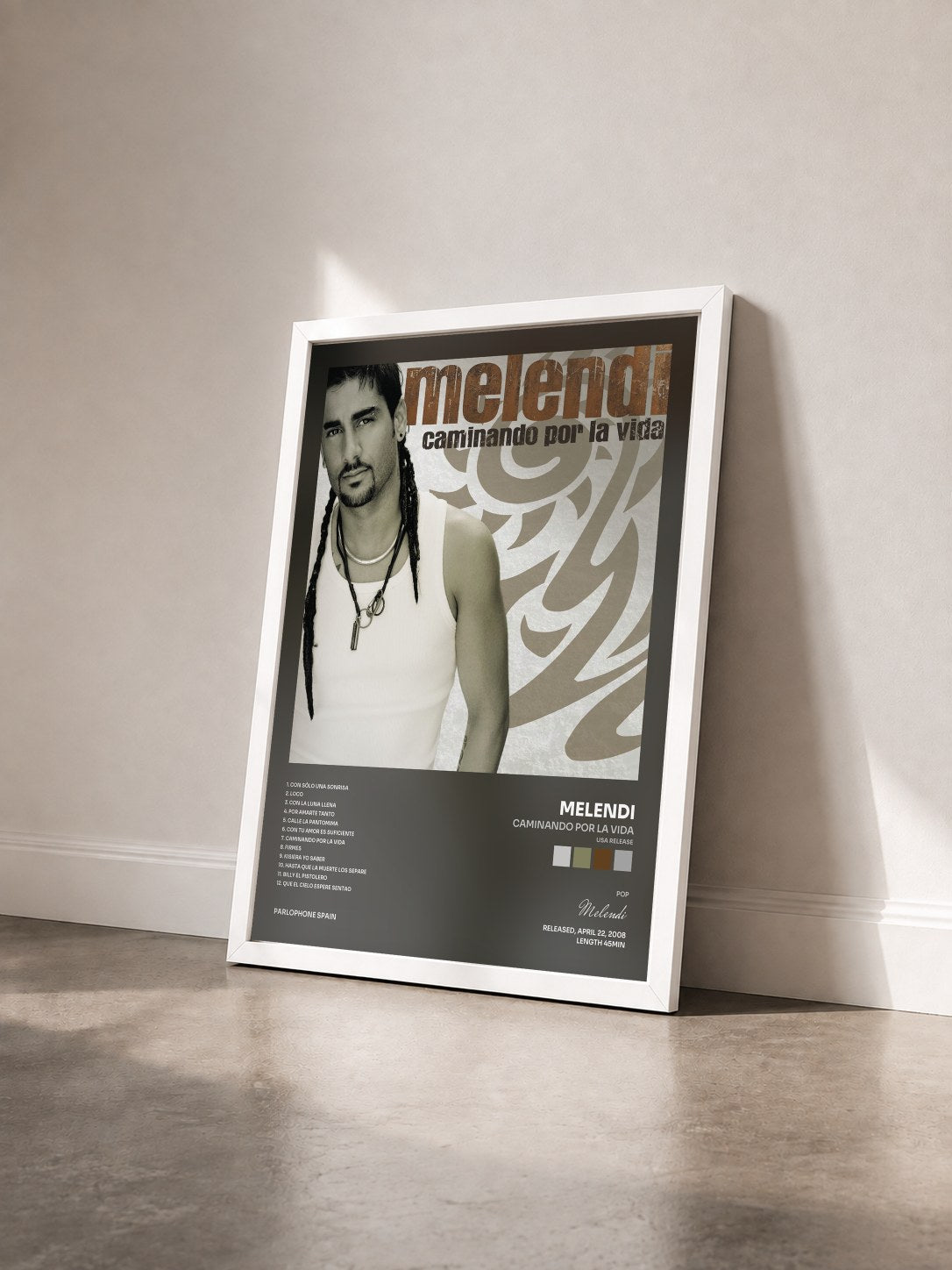 #blanc Tableau de l'album Caminando Por La Vida (USA Release) de Melendi vu de trois quarts, cadre blanc
