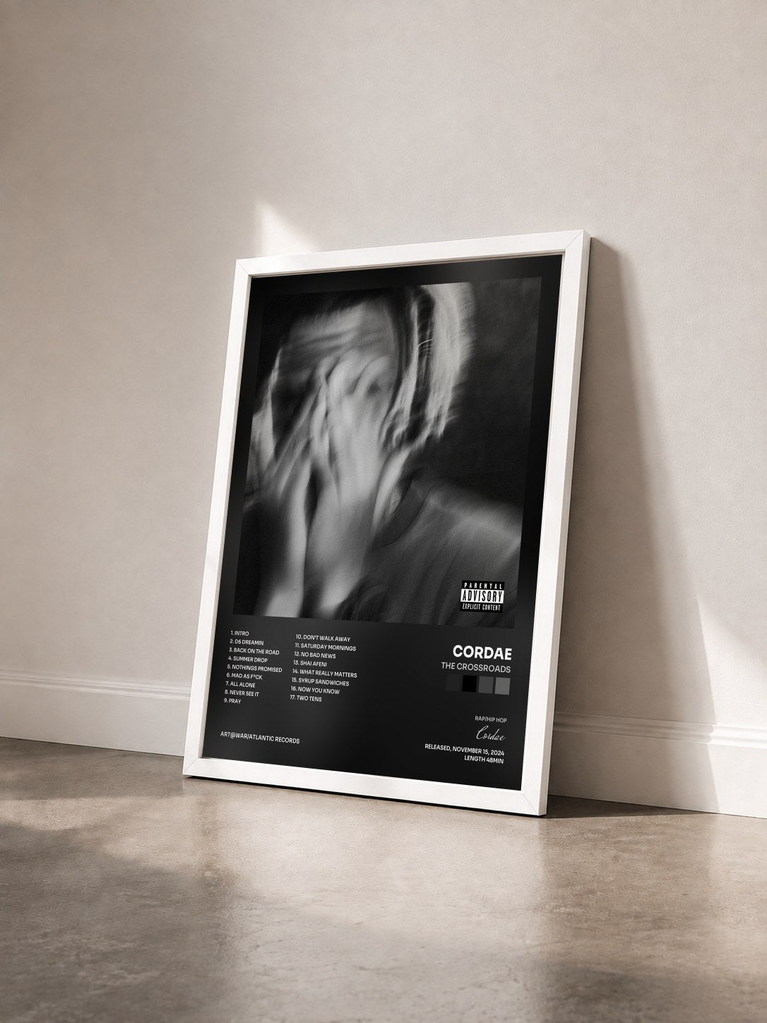 #blanc Tableau de l'album The Crossroads de Cordae vu de trois quarts, cadre blanc