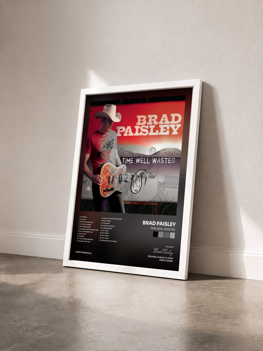 #blanc Tableau de l'album Time Well Wasted de Brad Paisley vu de trois quarts, cadre blanc