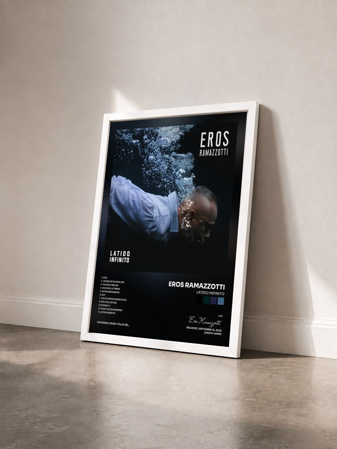 #blanc Tableau de l'album Latido Infinito de Eros Ramazzotti vu de trois quarts, cadre blanc