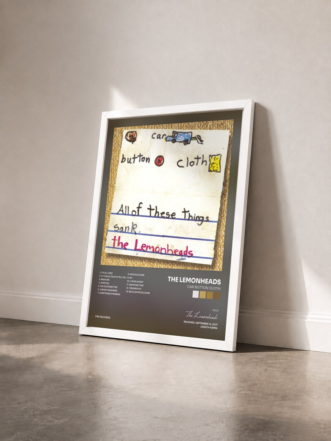 #blanc Tableau de l'album Car Button Cloth de The Lemonheads vu de trois quarts, cadre blanc