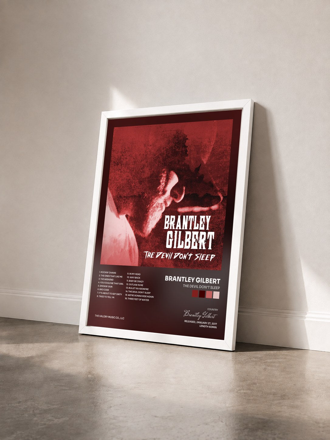 #blanc Tableau de l'album The Devil Don't Sleep de Brantley Gilbert vu de trois quarts, cadre blanc