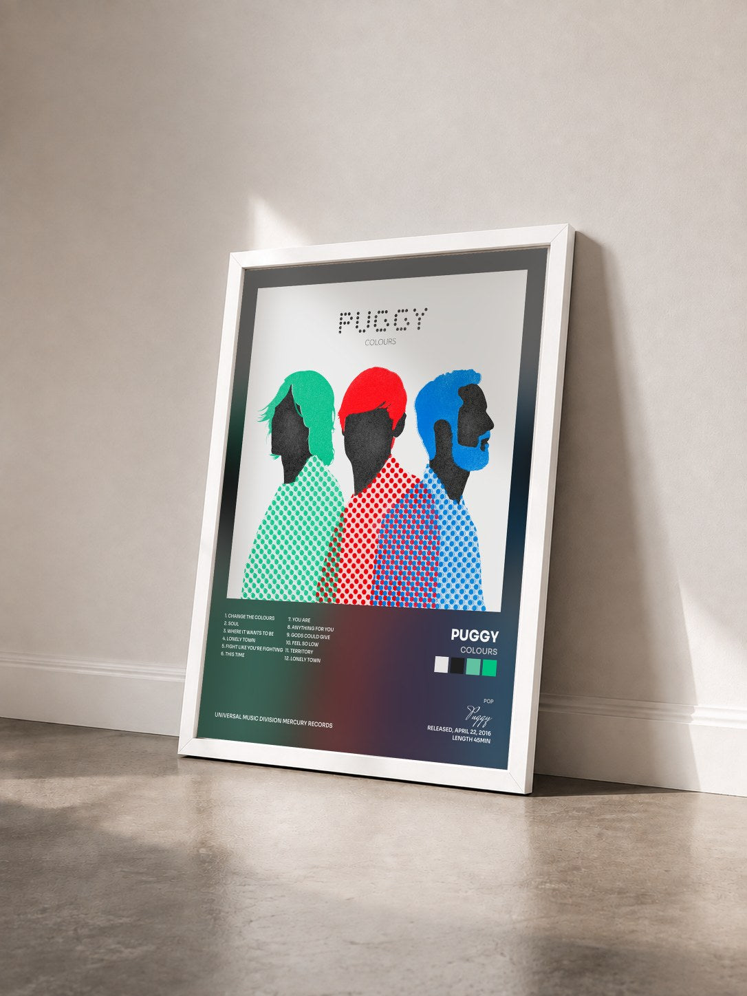 #blanc Tableau de l'album Colours de Puggy vu de trois quarts, cadre blanc