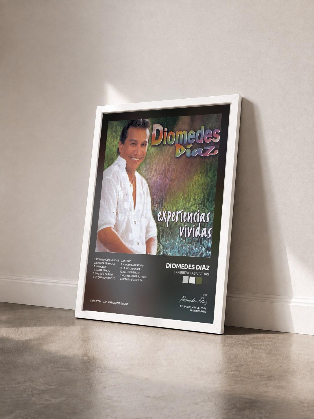 #blanc Tableau de l'album Experiencias Vividas de Diomedes Diaz vu de trois quarts, cadre blanc
