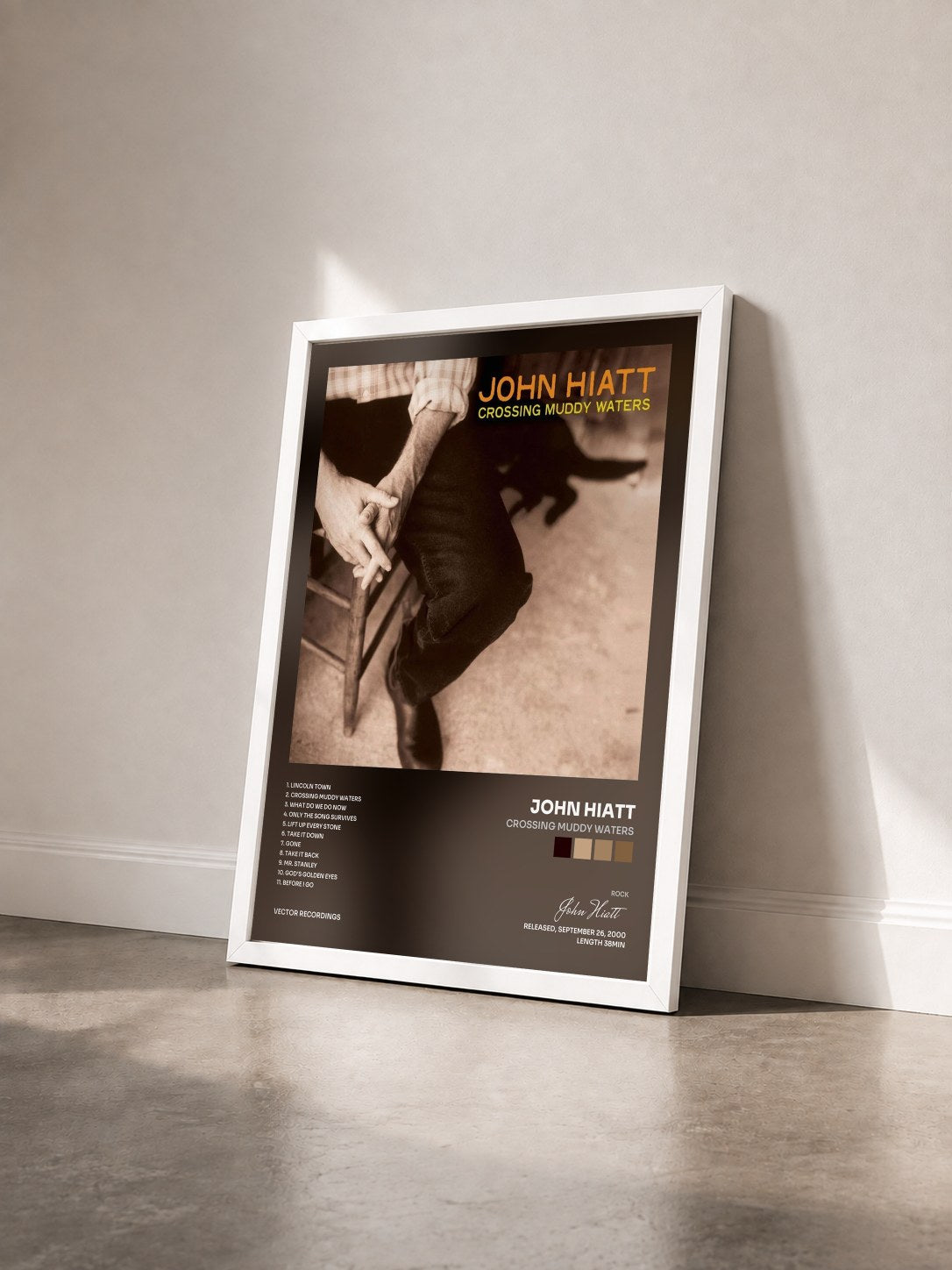 #blanc Tableau de l'album Crossing Muddy Waters de John Hiatt vu de trois quarts, cadre blanc