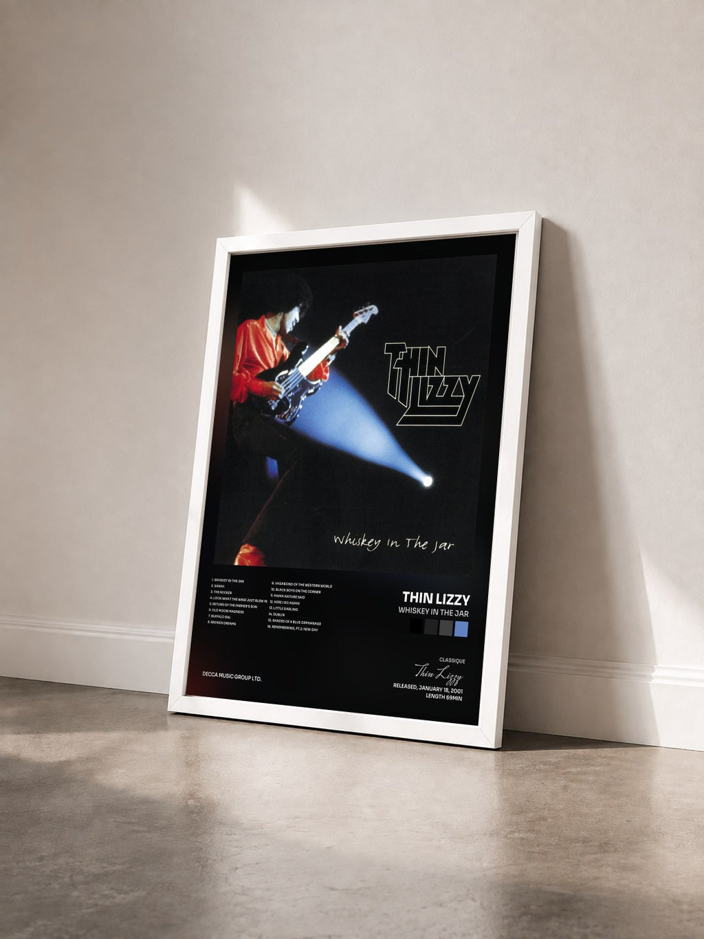 #blanc Tableau de l'album Whiskey In The Jar de Thin Lizzy vu de trois quarts, cadre blanc