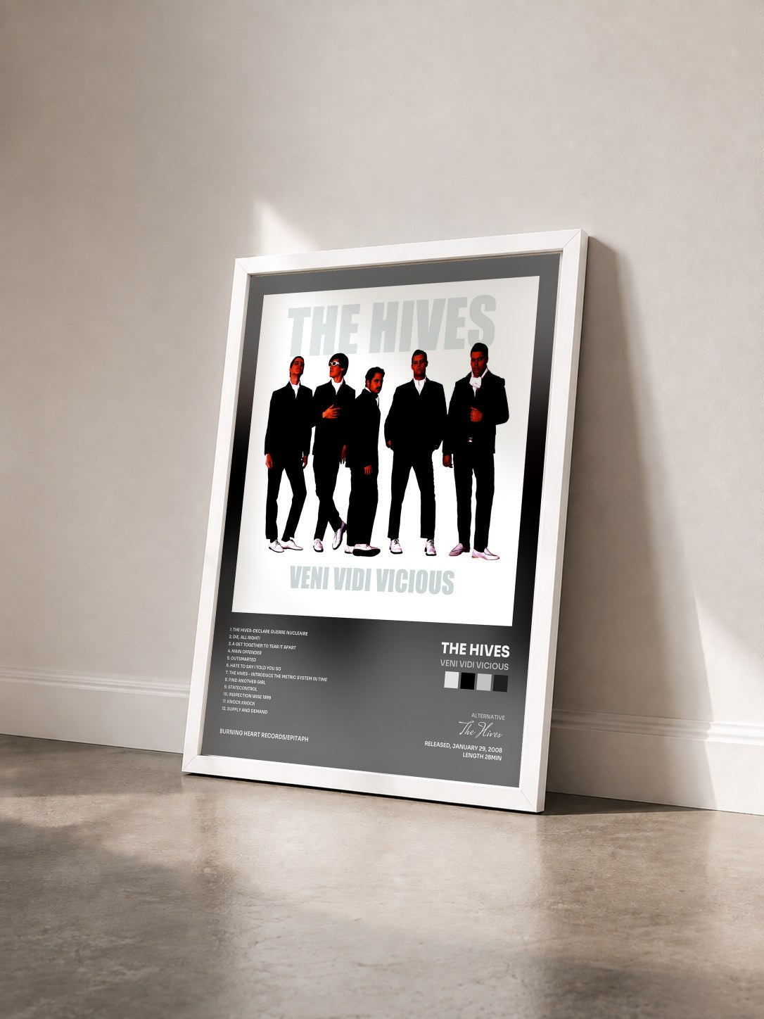 #blanc Tableau de l'album Veni Vidi Vicious de The Hives vu de trois quarts, cadre blanc