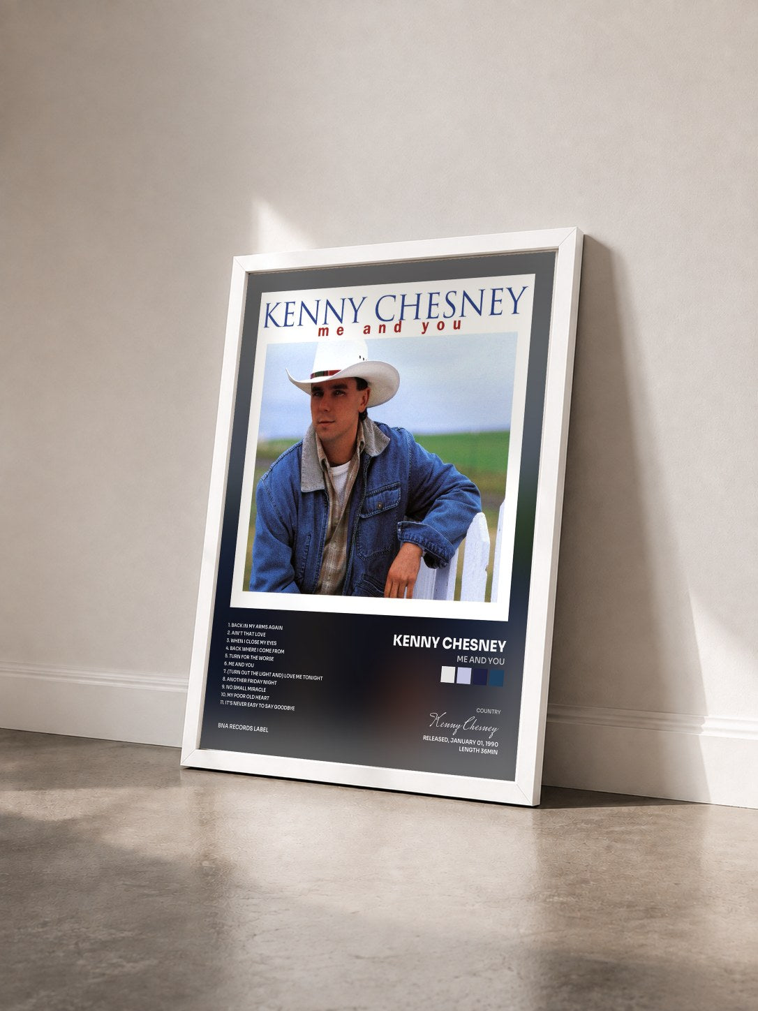 #blanc Tableau de l'album Me And You de Kenny Chesney vu de trois quarts, cadre blanc