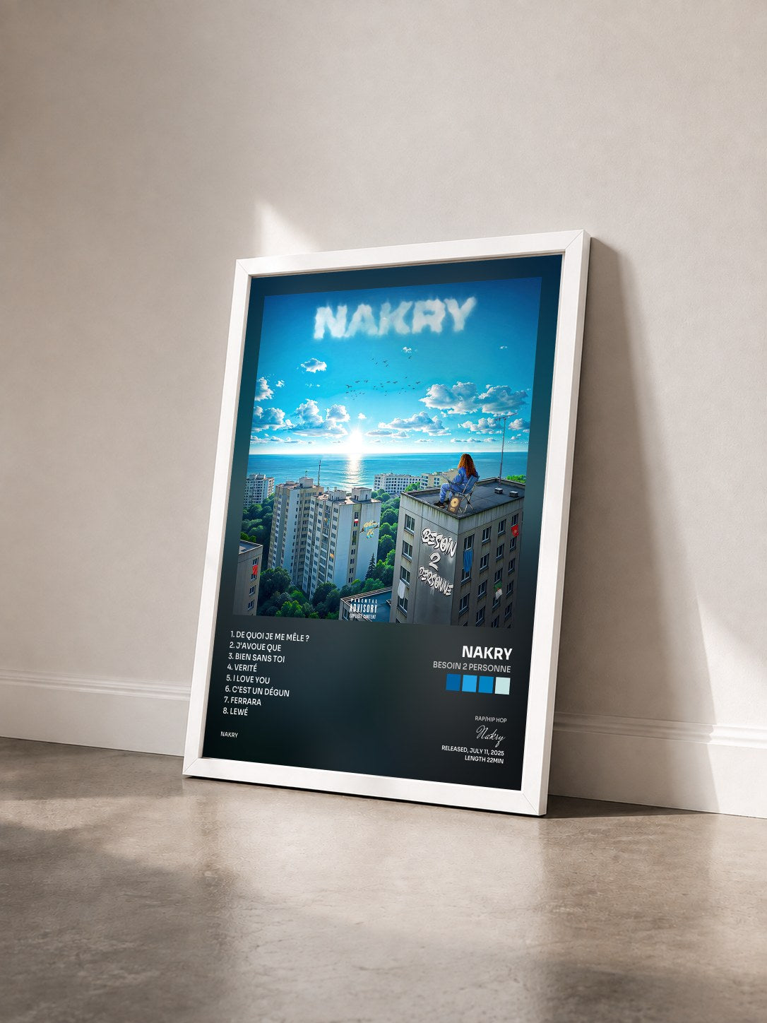 #blanc Tableau de l'album Besoin 2 Personne de Nakry vu de trois quarts, cadre blanc