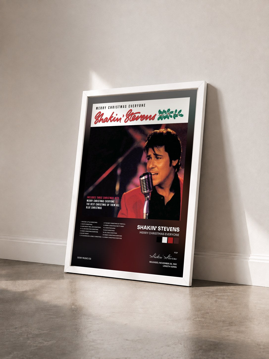 #blanc Tableau de l'album Merry Christmas Everyone de Shakin' Stevens vu de trois quarts, cadre blanc