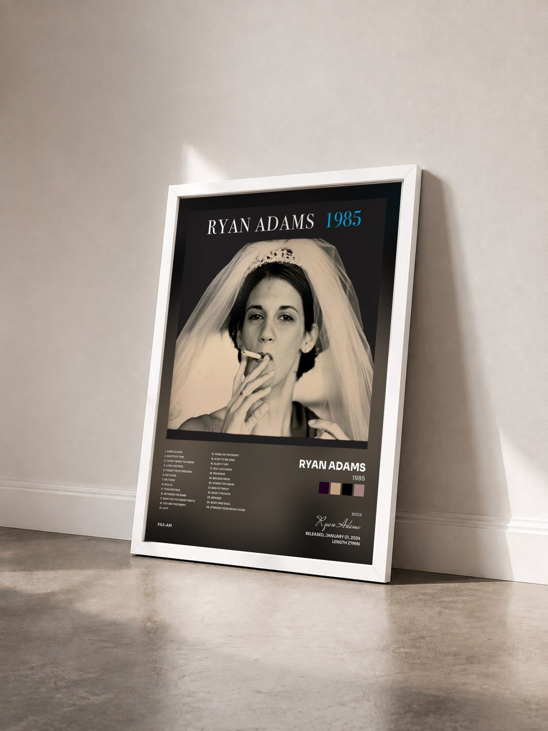 #blanc Tableau de l'album 1985 de Ryan Adams vu de trois quarts, cadre blanc