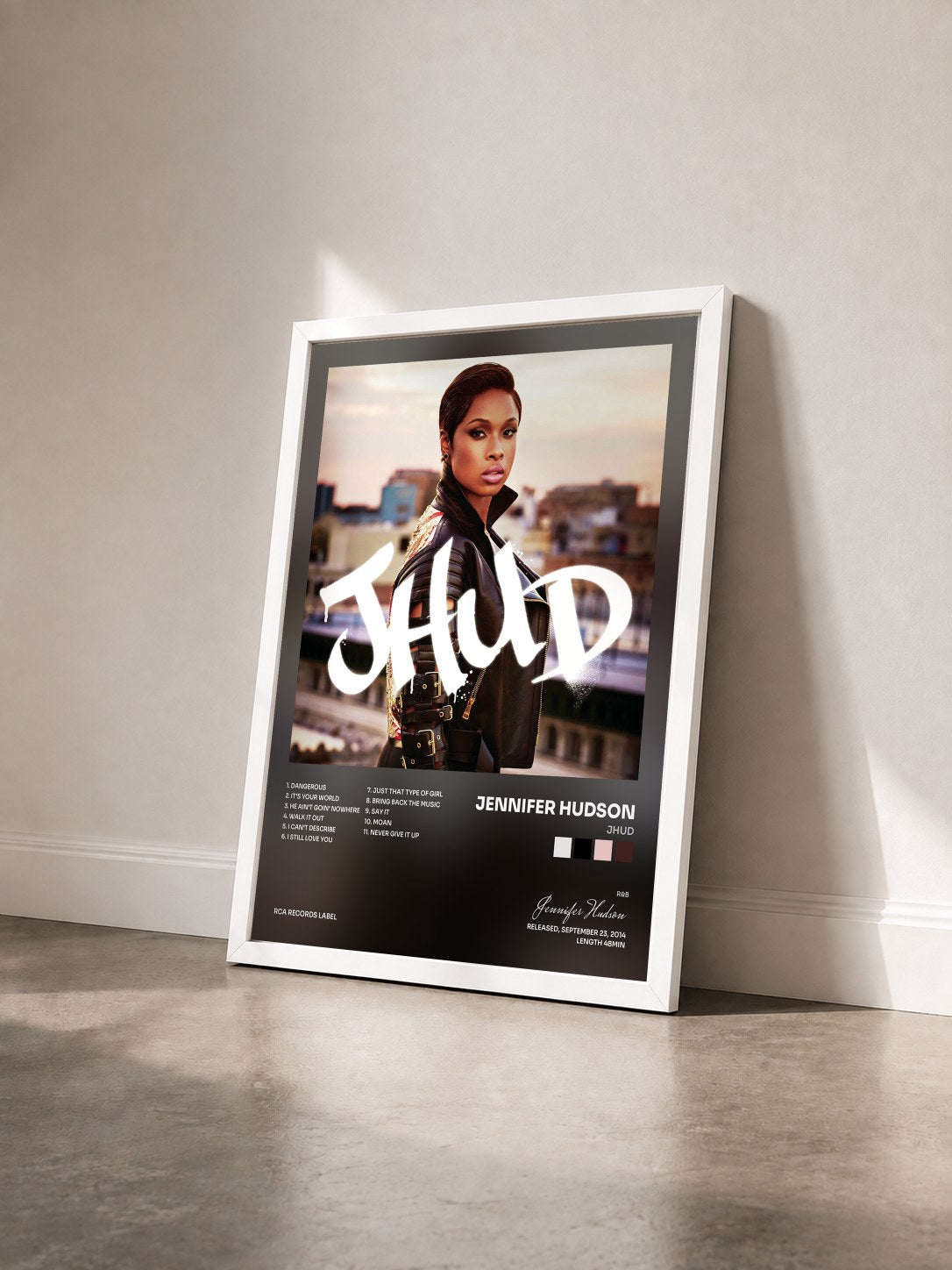 #blanc Tableau de l'album JHUD de Jennifer Hudson vu de trois quarts, cadre blanc