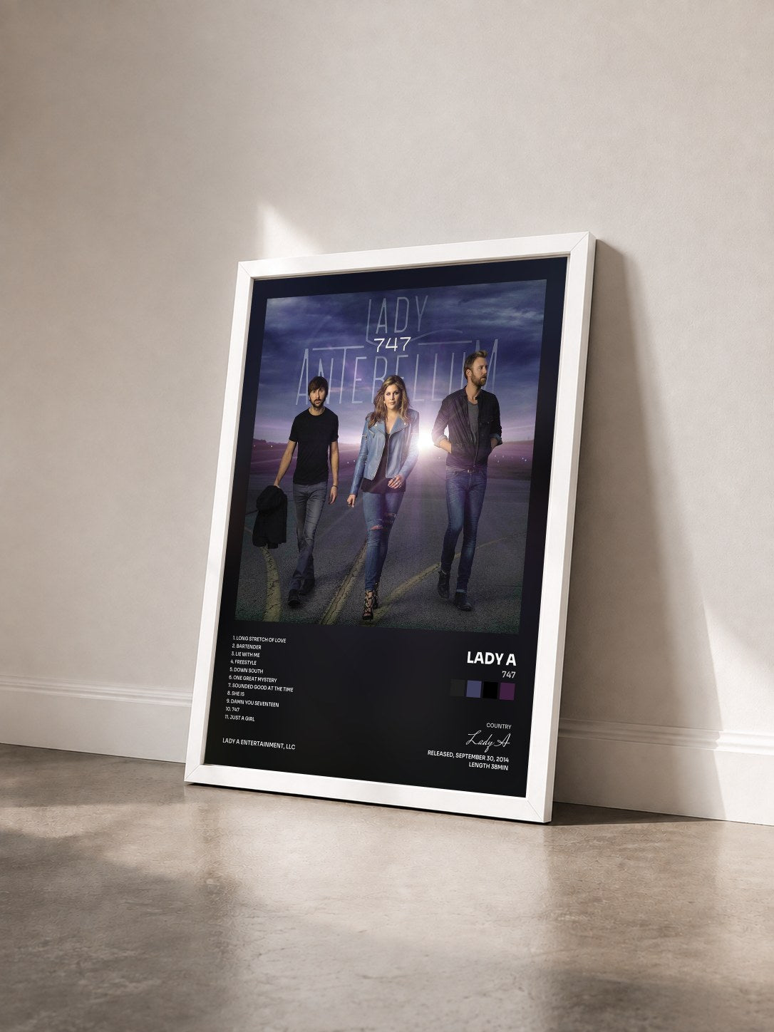 #blanc Tableau de l'album 747 de Lady A vu de trois quarts, cadre blanc