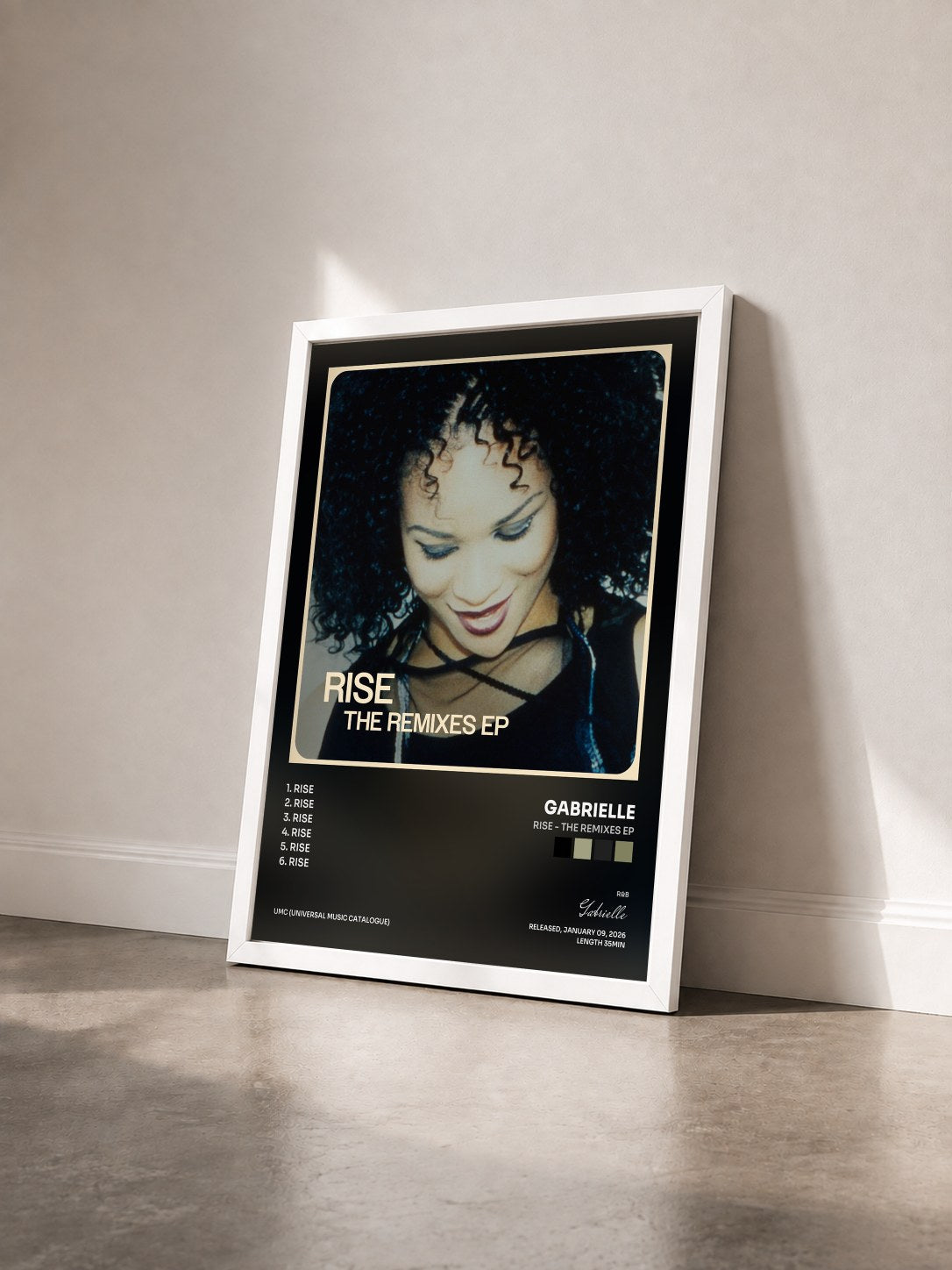 #blanc Tableau de l'album Rise - The Remixes EP de Gabrielle vu de trois quarts, cadre blanc