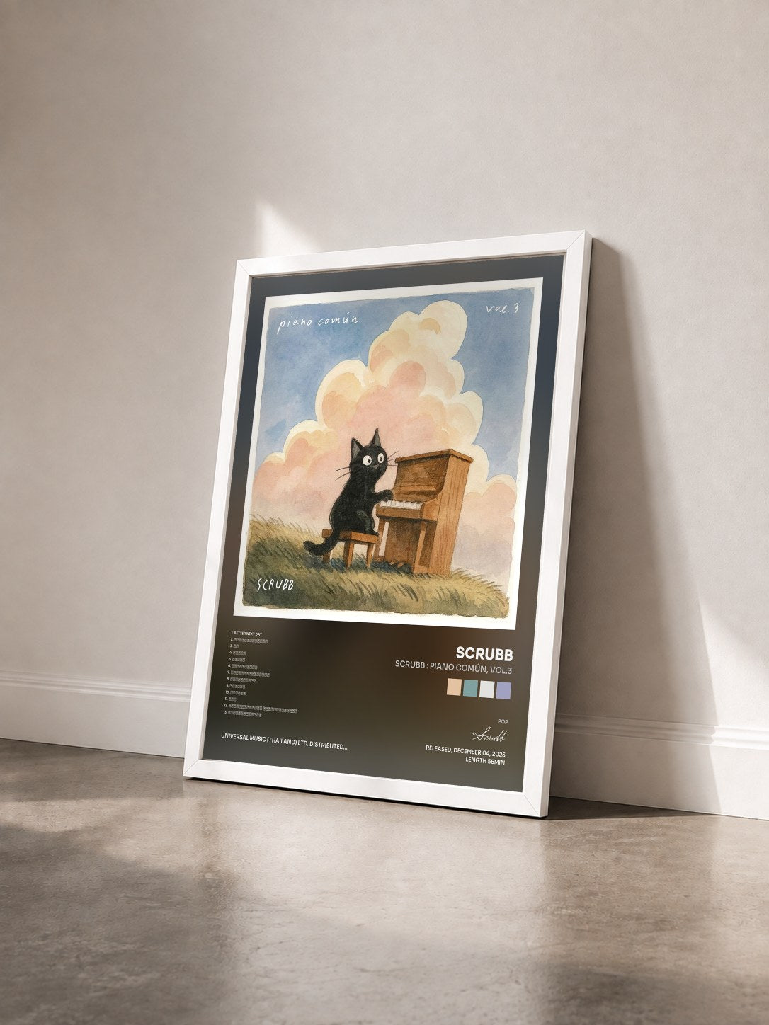 #blanc Tableau de l'album SCRUBB : Piano Común, Vol.3 de Scrubb vu de trois quarts, cadre blanc