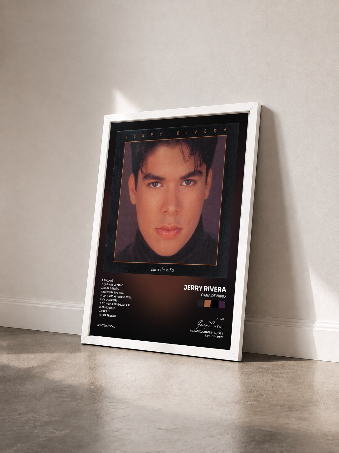 #blanc Tableau de l'album Cara De Niño de Jerry Rivera vu de trois quarts, cadre blanc