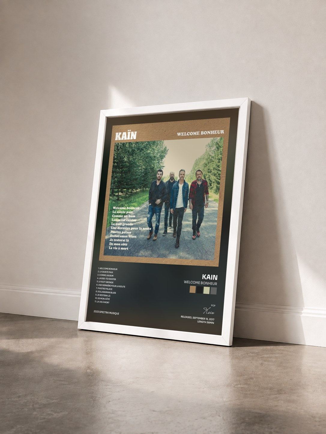 #blanc Tableau de l'album Welcome bonheur de Kain vu de trois quarts, cadre blanc