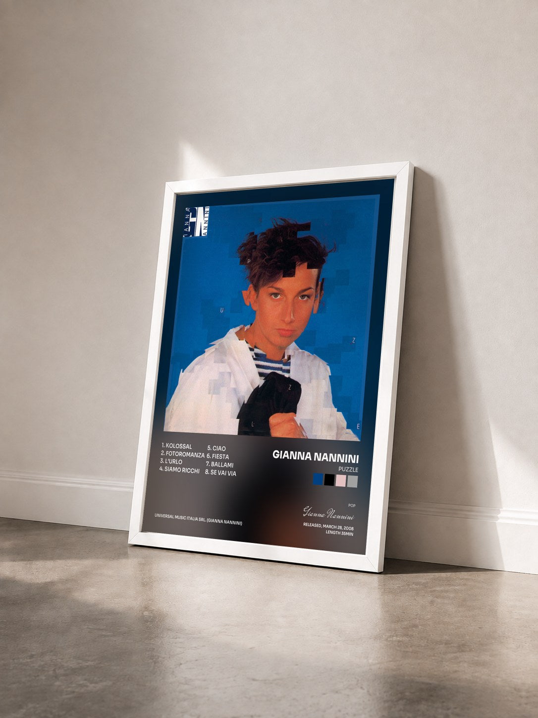 #blanc Tableau de l'album Puzzle de Gianna Nannini vu de trois quarts, cadre blanc