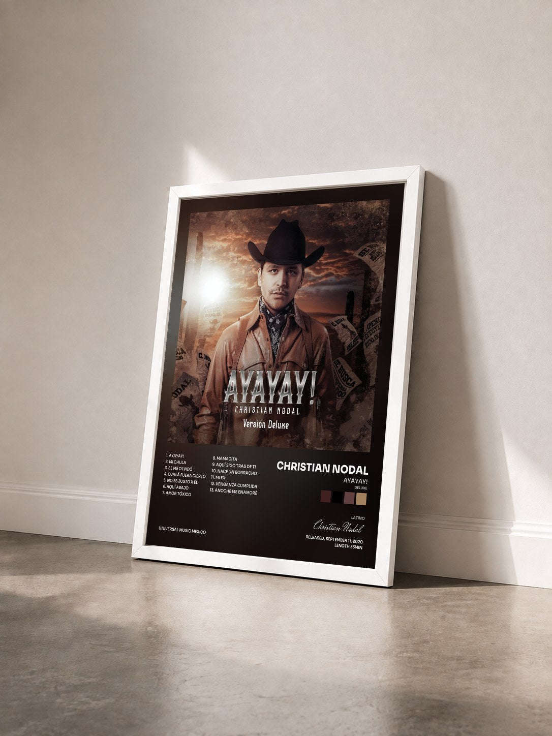 #blanc Tableau de l'album AYAYAY! (Deluxe) de Christian Nodal vu de trois quarts, cadre blanc