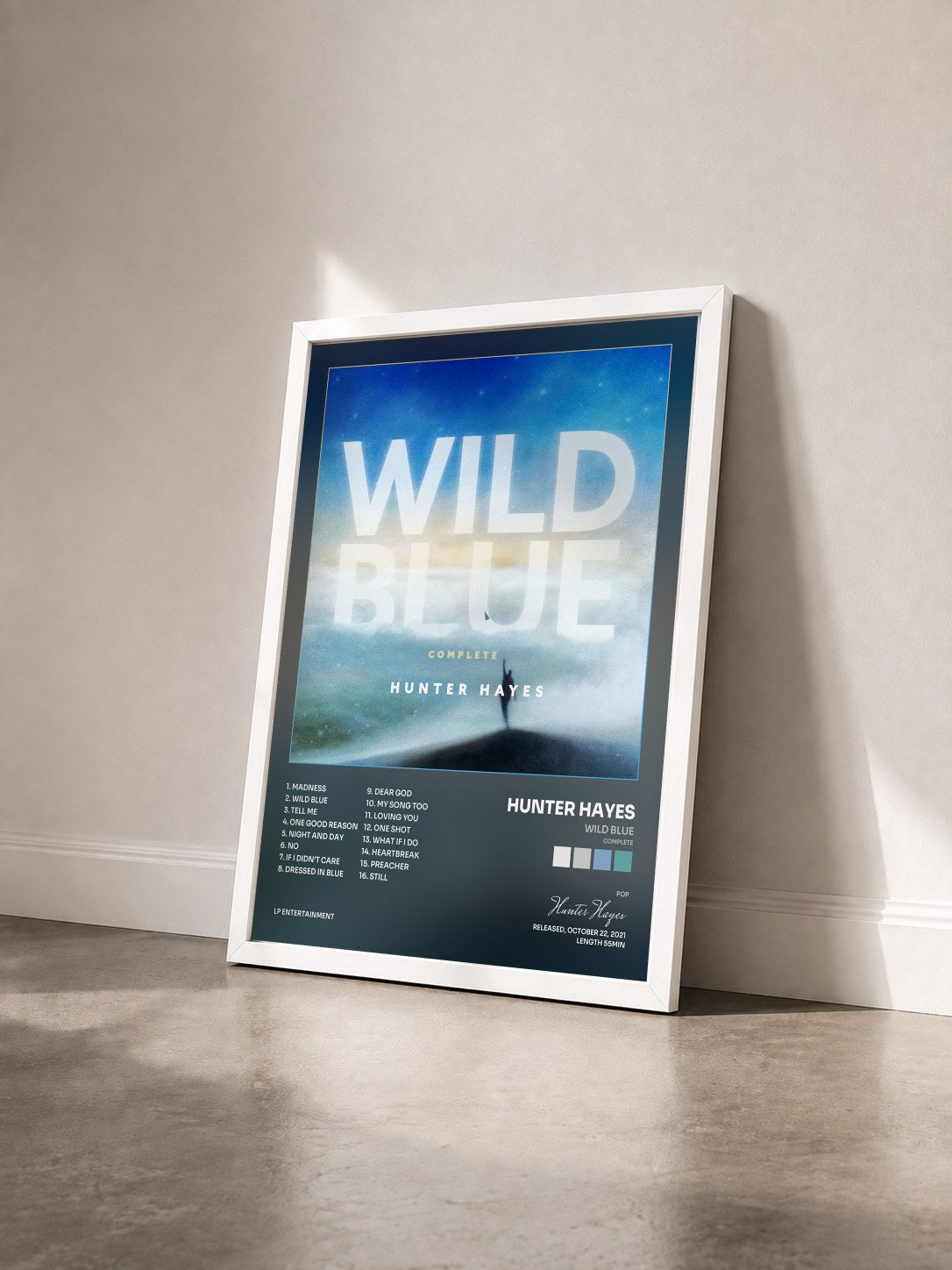 #blanc Tableau de l'album Wild Blue (Complete) de Hunter Hayes vu de trois quarts, cadre blanc