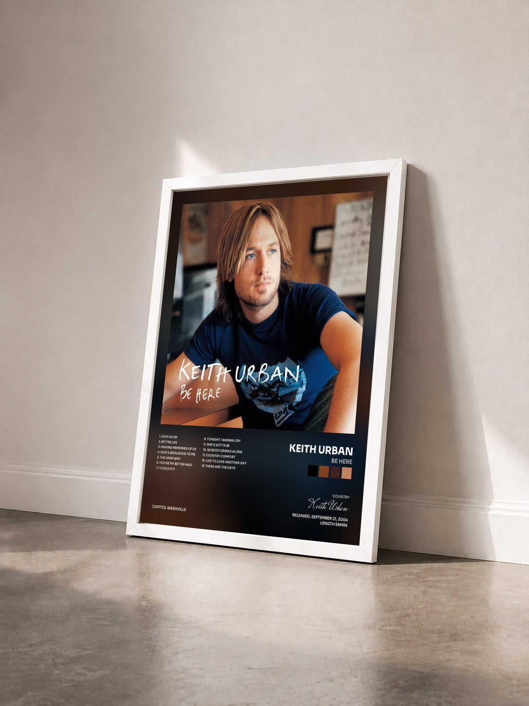 #blanc Tableau de l'album Be Here de Keith Urban vu de trois quarts, cadre blanc