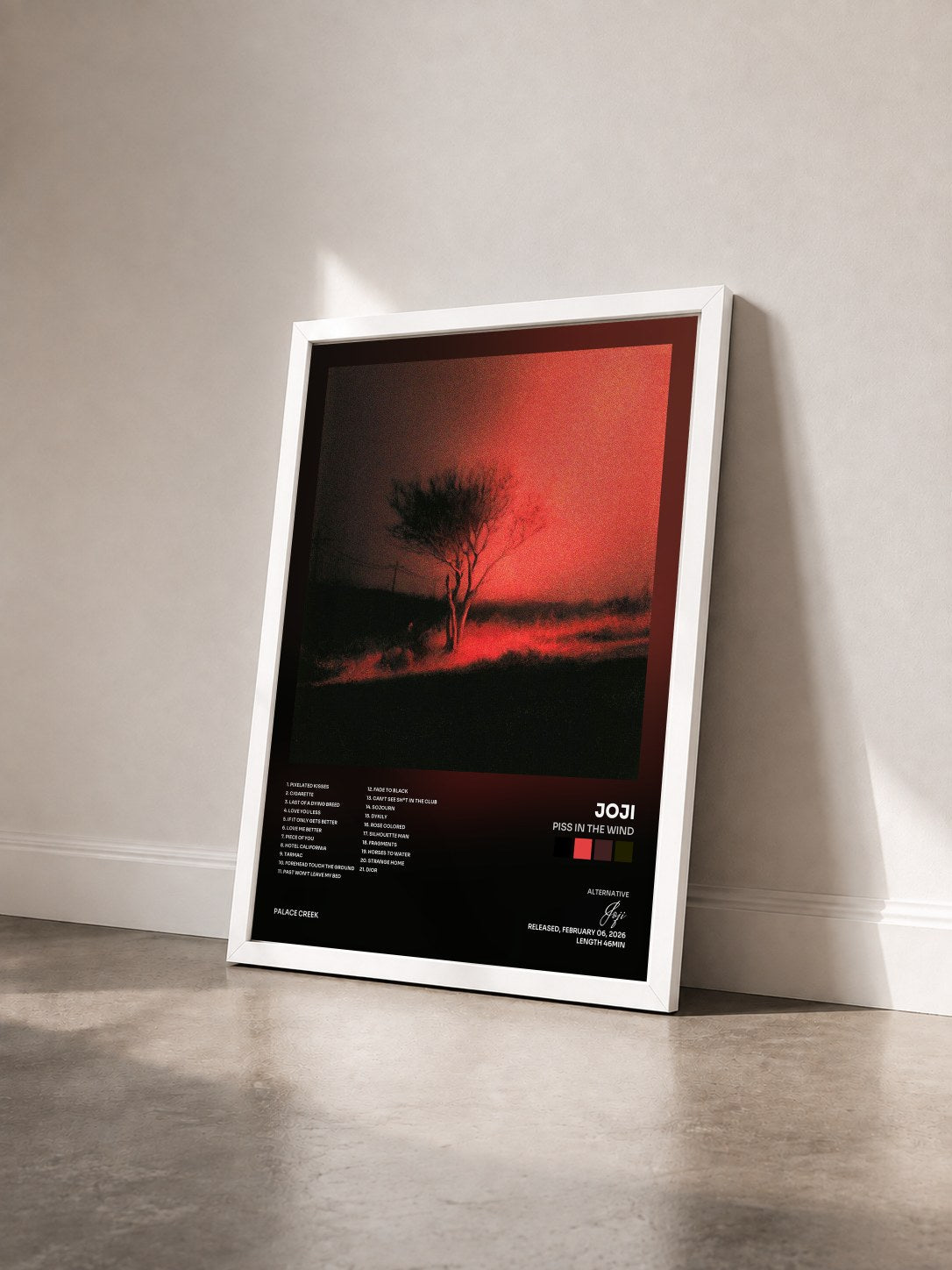#blanc Tableau de l'album Piss In The Wind de Joji vu de trois quarts, cadre blanc