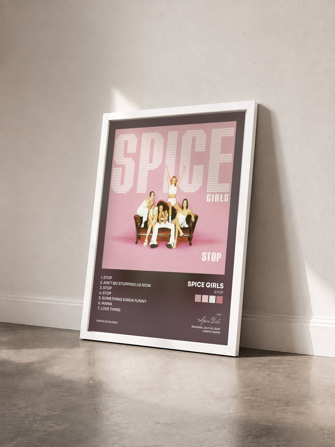 #blanc Tableau de l'album Stop de Spice Girls vu de trois quarts, cadre blanc