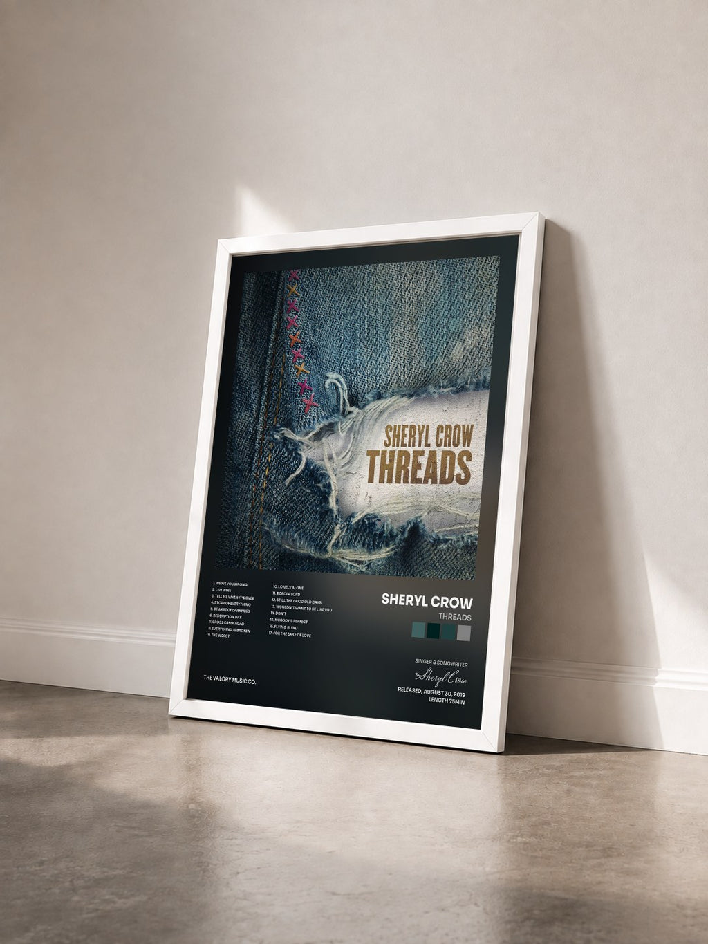 #blanc Threads by Sheryl Crow as a framed art print seen at an angle, white frame