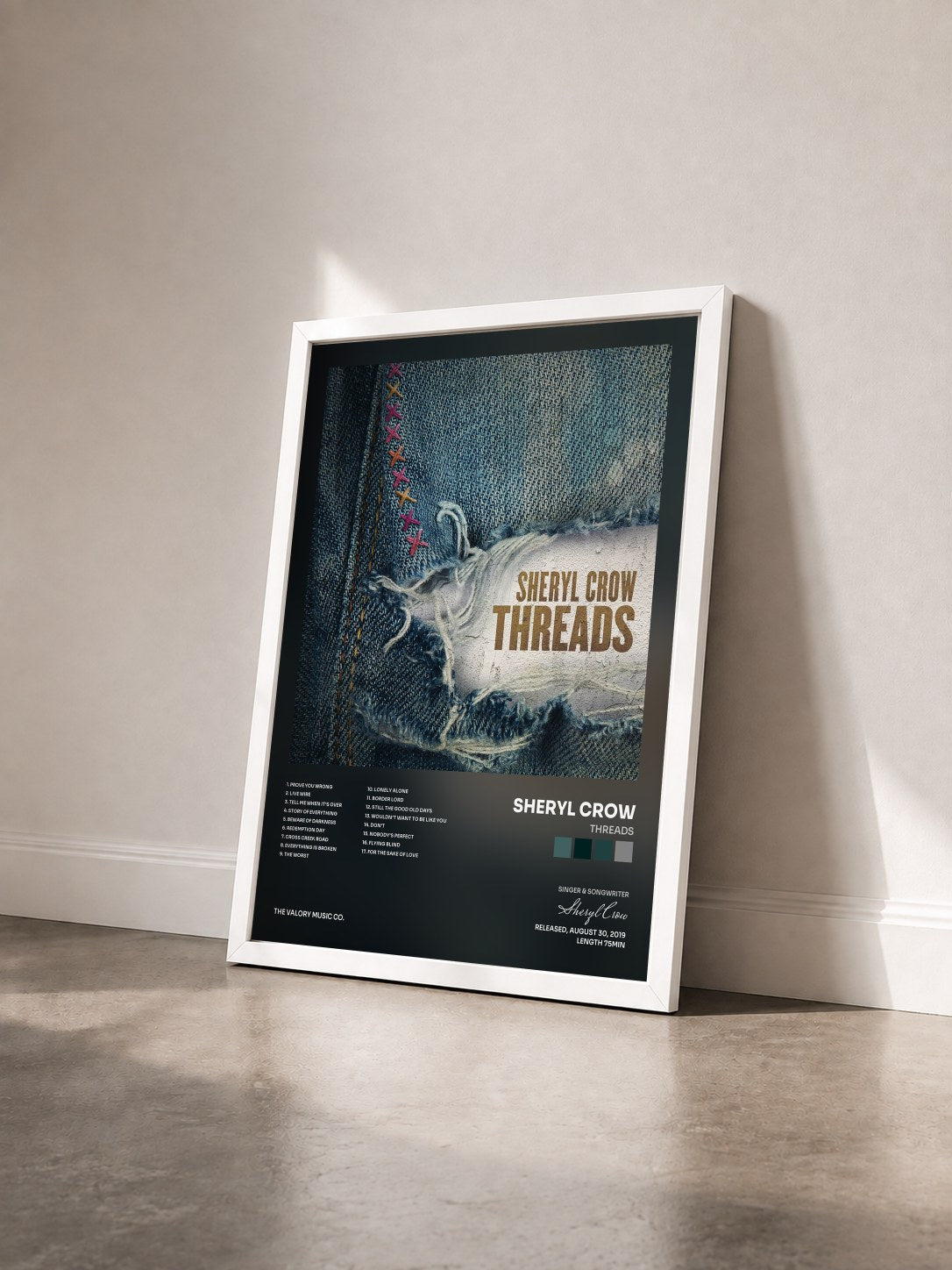 #blanc Tableau de l'album Threads de Sheryl Crow vu de trois quarts, cadre blanc