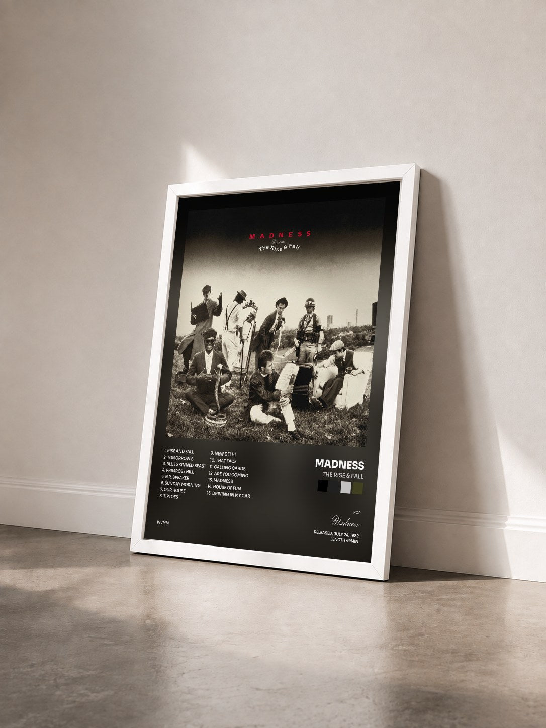 #blanc Tableau de l'album The Rise & Fall de Madness vu de trois quarts, cadre blanc