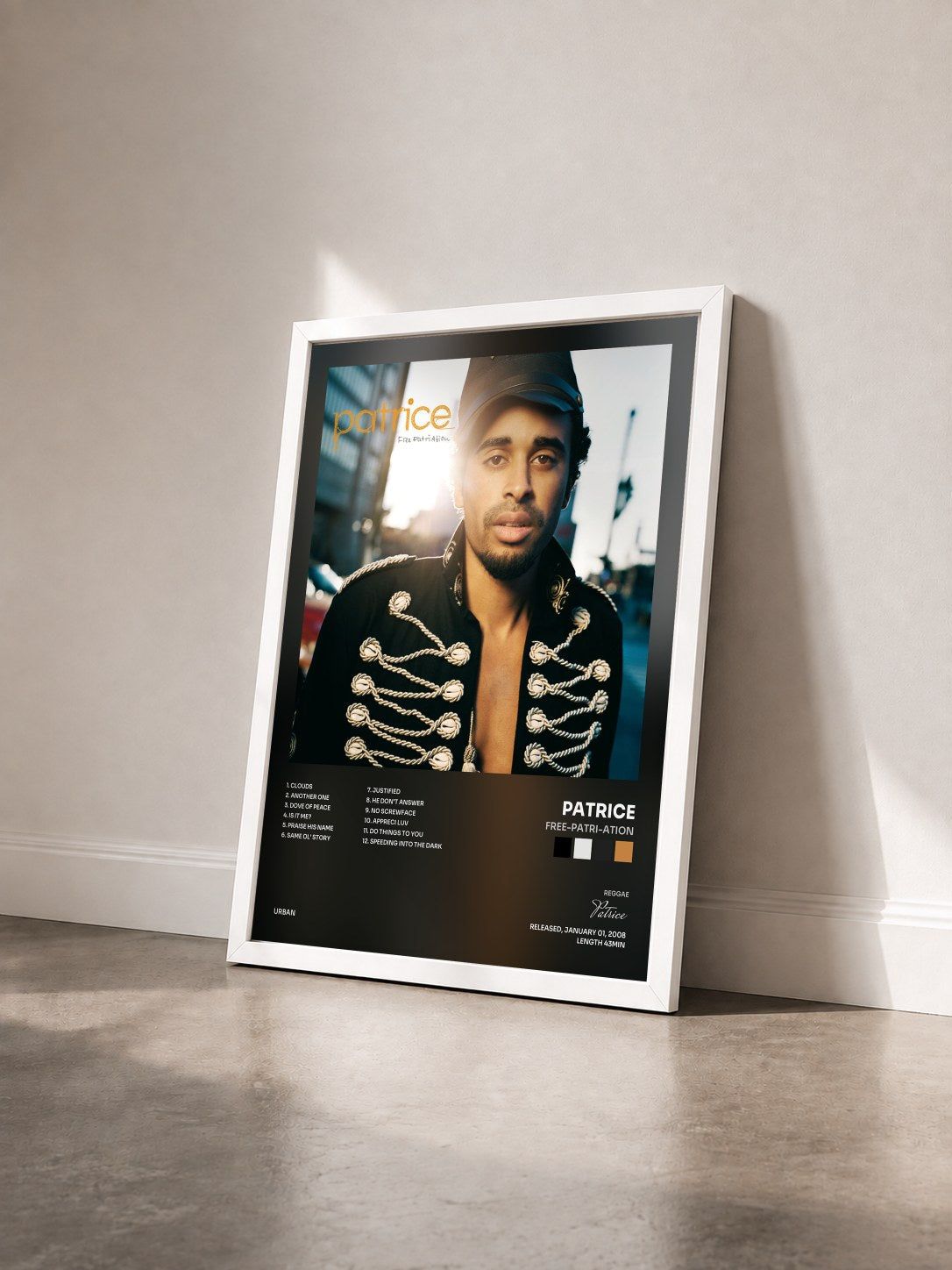 #blanc Tableau de l'album Free-Patri-Ation de Patrice vu de trois quarts, cadre blanc
