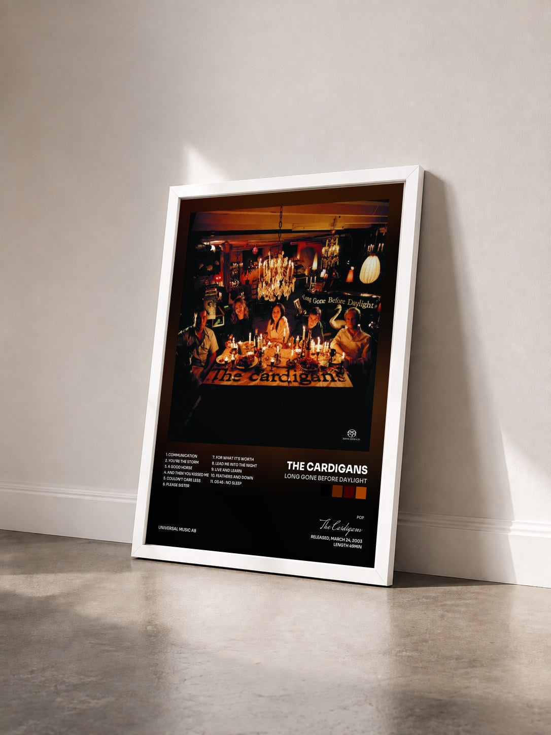 #blanc Tableau de l'album Long Gone Before Daylight de The Cardigans vu de trois quarts, cadre blanc