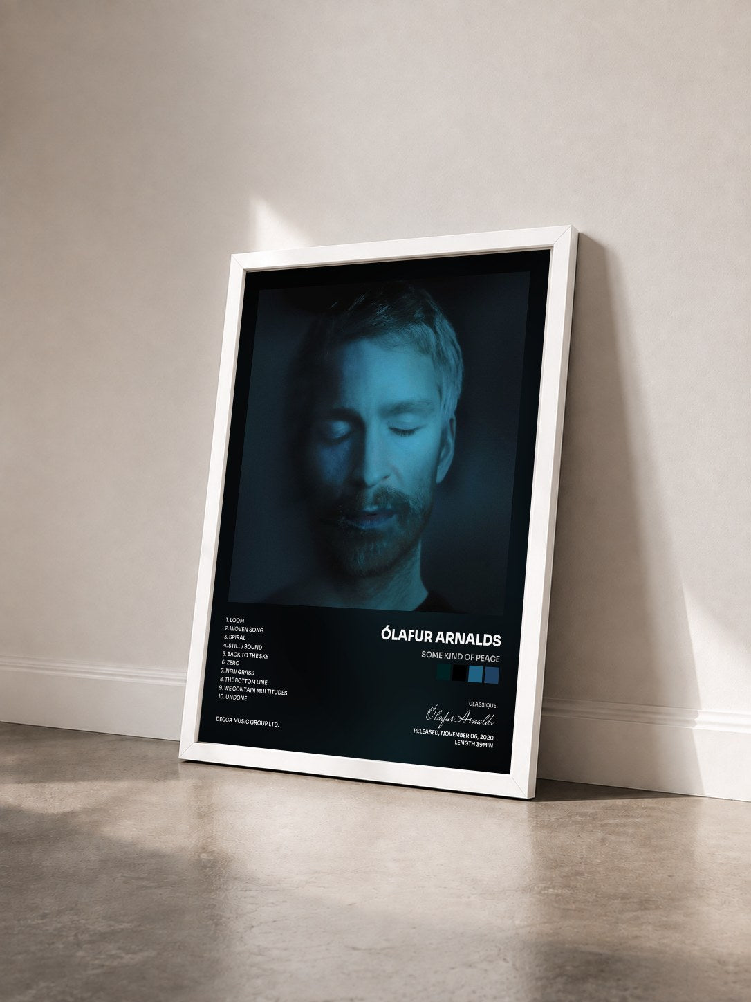 #blanc Tableau de l'album some kind of peace de Ólafur Arnalds vu de trois quarts, cadre blanc